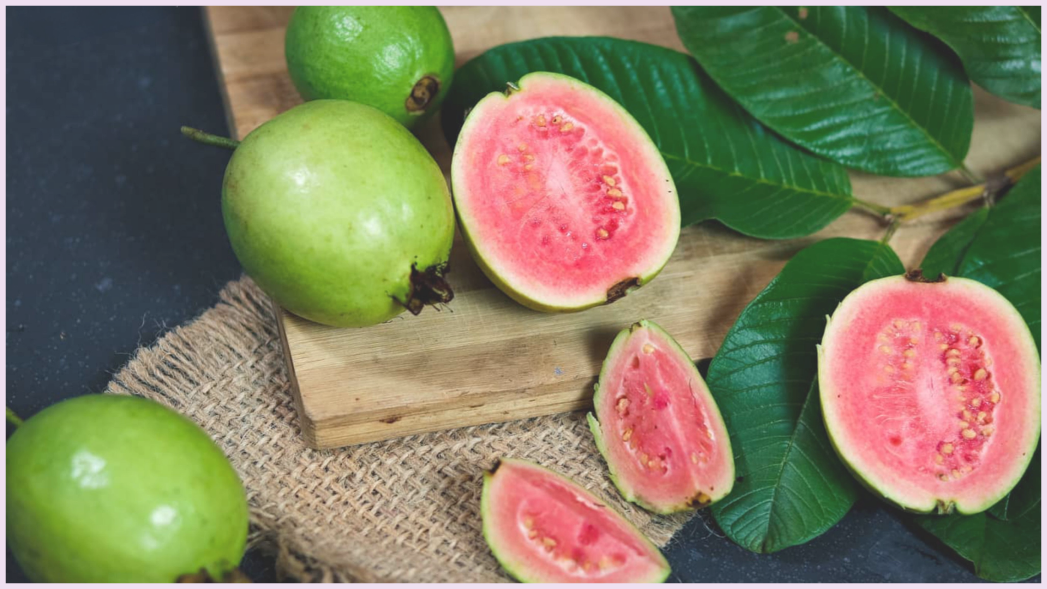 Guava fruit with pink pulp inside